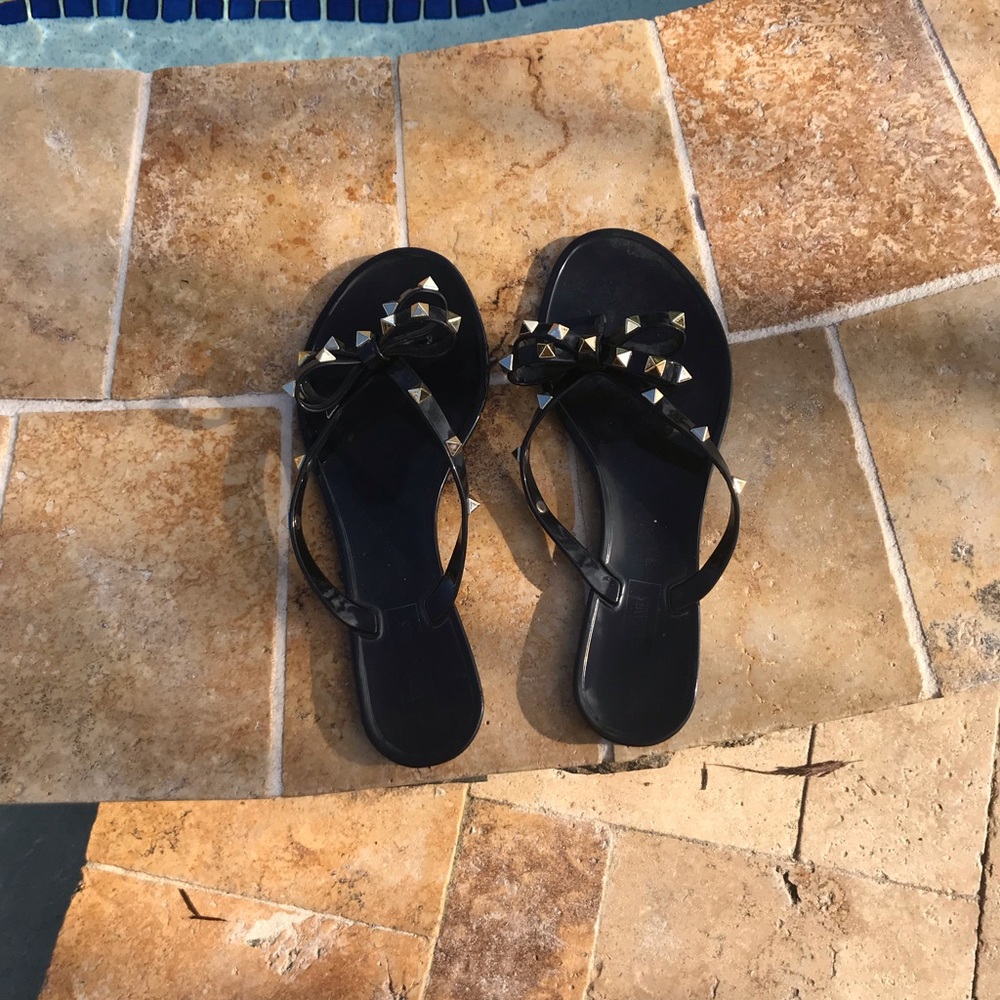 Black stud flip flops